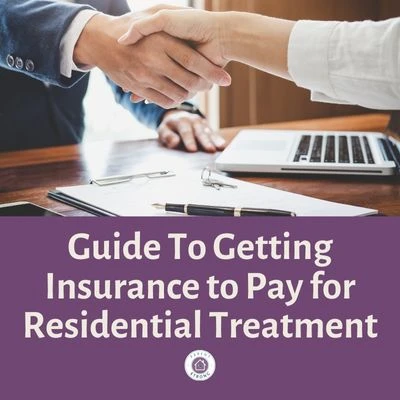 Two people shaking hands over a desk with atext overlay that reads as Guide To Getting Insurance to Pay for Residential Treatment.