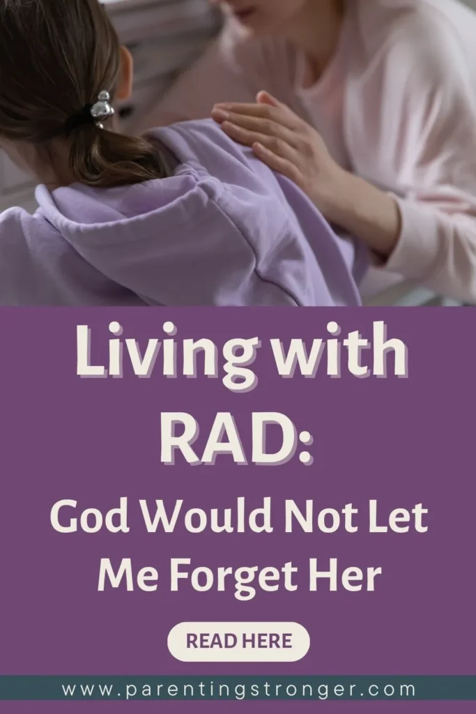 A child comforted by her mom with a text Living with RAD God Would Not Let Me Forget Her.